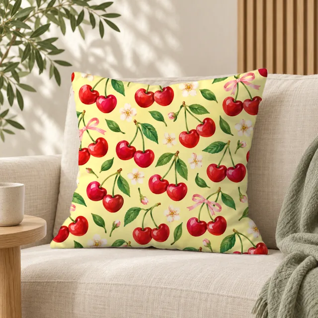 Square pillow mockup on a sofa, cherry blossom pattern